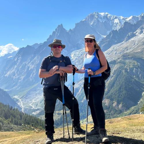 Happy couple with a view of Val Ferret